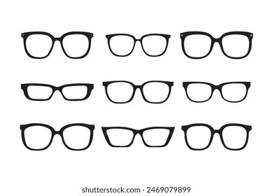 Set of silhouette glasses of various shapes and sizes. The glasses are all black and arranged in a row isolated on a white background