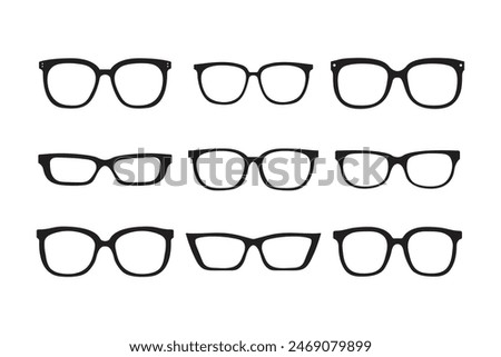 Set of silhouette glasses of various shapes and sizes. The glasses are all black and arranged in a row isolated on a white background