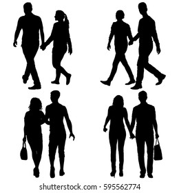 Set Silhouette man and woman walking hand in hand.