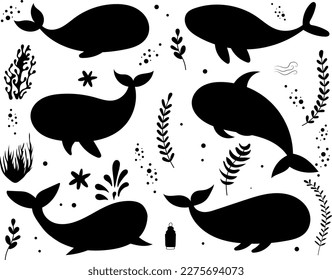 conjunto de ballenas de silueta sobre el vector de fondo blanco