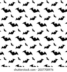 set of silhouettes of animals. Monochrome seamless pattern with soaring bats. Halloween black bat icon .vector Halloween background.Flying night creatures illustration.