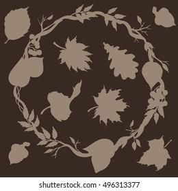 set of silhouettes of autumn leaves and a wreath of branches and plants