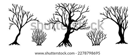 Set of silhouettes of bare trees, bushes.Vector graphics.	 Foto d'archivio © 