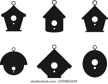 Set of silhouettes of birdhouses with hanging rings. Vector, transparent background