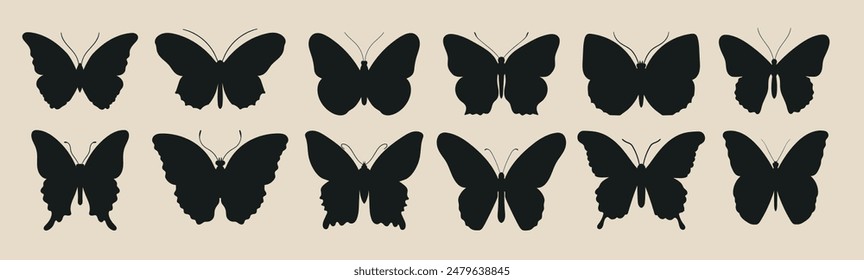 Set of silhouettes of butterflies of different shapes.
