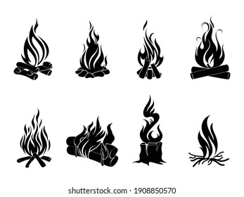 Set of silhouettes campfire. Collection of burning bonfire with wood. Firewood and campfire.  Burning woodpile. Tourism. Camping adventures.  Vector illustration of bonfire on night for travel camp. 
