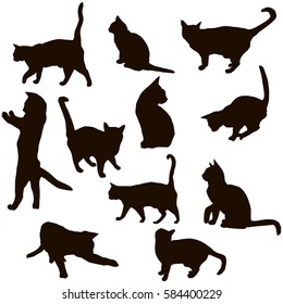 
Set of silhouettes of cats in different poses