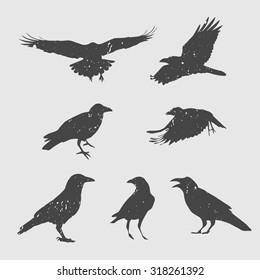 set of silhouettes of crows