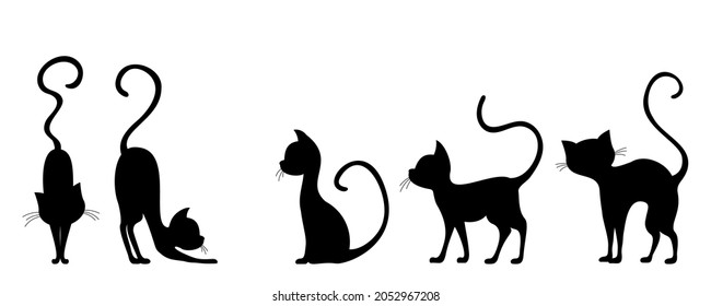 Set of silhouettes of elegant cats on a white background