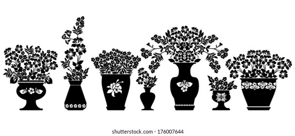Set of silhouettes of flowers in pots and vase. Black and White color. Vector illustration