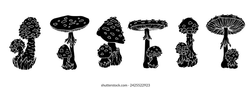 Set of silhouettes of forest mushrooms toadstools.Vector graphics.