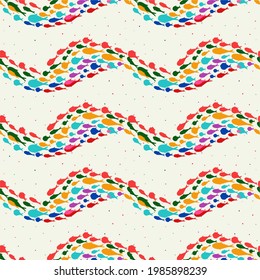 Set of silhouettes of groups of multicolored marine fish. Seamless pattern a colony of small fish. Vector Icon 