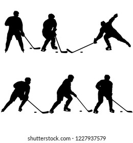 Set of silhouettes of hockey player. Isolated on white