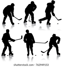 Set of silhouettes hockey player. Isolated on white.