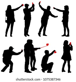 Set silhouettes man and woman taking selfie with smartphone on white background