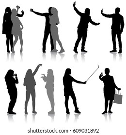 Set silhouettes man and woman taking selfie with smartphone on white background. Vector illustration.