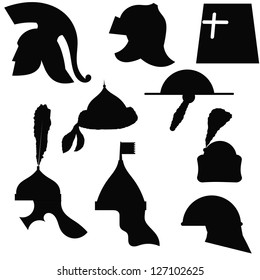 A set of silhouettes of medieval military helmets