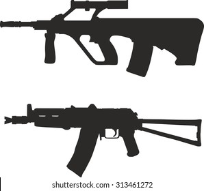 A set of silhouettes of modern weapons.