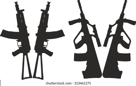 A set of silhouettes of modern weapons.