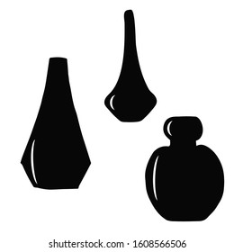 Set of silhouettes of perfume bottles. White isolated background. Vector stock illustration.