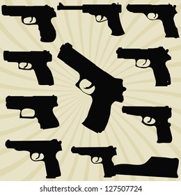 A set of silhouettes of pistols