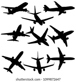 Set of silhouettes of planes from different eras on a white background