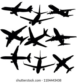 Set of silhouettes of planes from different eras on a white background