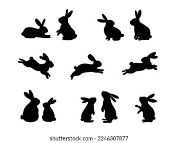 Set of silhouettes of rabbits in various poses. Rabbit animal icon isolated on white background. For Moon Festival, Chinese Lunar Year of the Rabbit, Easter decor.