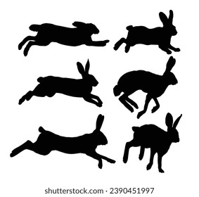 The set silhouettes of running hares.
