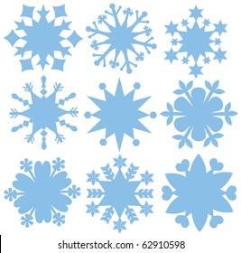 Set of silhouettes of simple snowflakes.