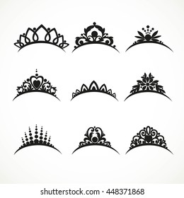 Set of silhouettes of tiaras of various shapes with flowers and hearts  on a white background