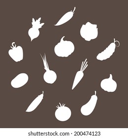set of silhouettes of white vegetables in a flat style on a dark background