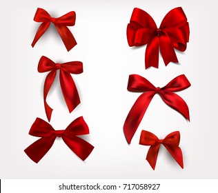 Set of silk red bows. Vector illustration