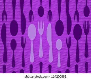 Set of silverware on metal surface