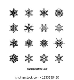 Set of simple hand-drawn icons of a snowflake. Black vector illustration on white background