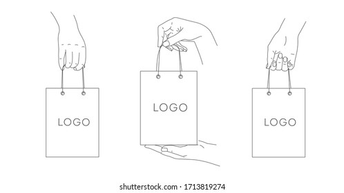 Set of simple line illustrations of hands holding shopping bags, different view and hand position, isolated