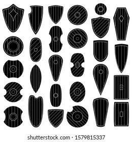 Set of simple monochrome vector images of medieval shields and bucklers.