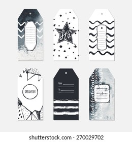 Set of six black and white tag templates in inky hand made style.
