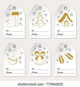 A set of six Christmas or New Year gift tags with holiday icons and winter symbols. Golden elements isolated on white background. Used for your design, scrapbook, wrapping, sale. Vector illustration.