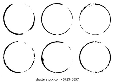 Set of six cofee ring stains. Grunge ink circles. Vector design element.