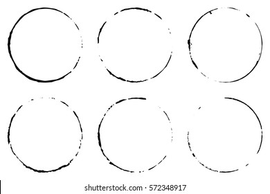 Set of six cofee ring stains. Grunge ink circles. Vector design element.