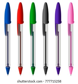 Set of six colored plastic ballpoint pens with caps, in a transparent hexagonal case, on a white background