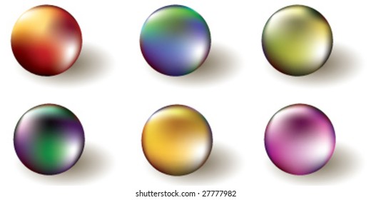 Set of six different color pearls.