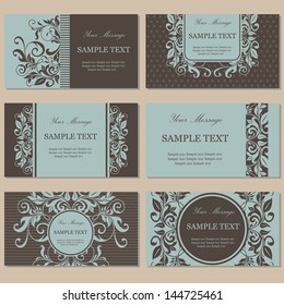 Set of six floral business cards.