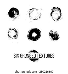 Set of six grunged dots by painbrush and ink