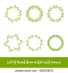 Set of six hand drawn circle floral frames.
