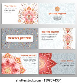 Set of six horizontal business cards. Oriental paisley flowers with peacock feathers