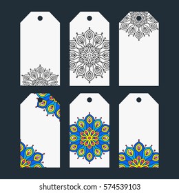 Set of six printable tags with hand drawn decor. Isolated. Collection of label with doodle mandala ornament. Outline and color elements. White, blue, yellow, black and pink colors.