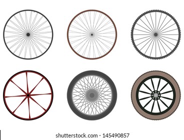 Set of six silhouettes of wheels with spokes on a white background.