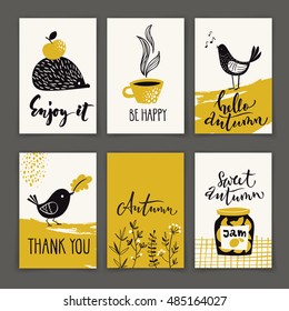 Set of six vector autumn calligraphic posters. Enjoy it, be happy, autumn, hello autumn calligraphic cards. Vector abstract design. 